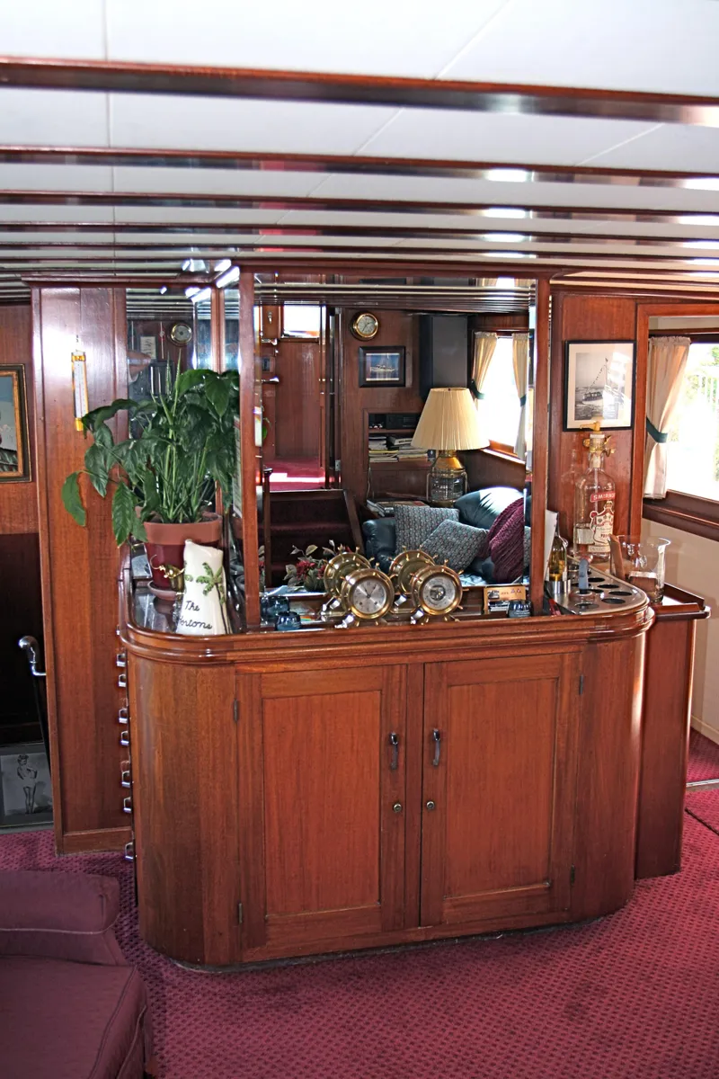 Slide: The Image of Interior of a classic yacht with wooden furnishings, built in 1946. - 31