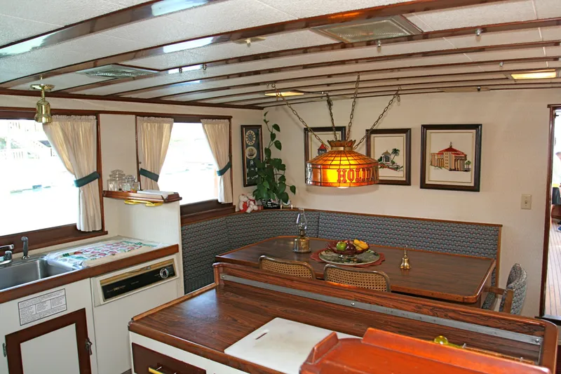 Slide: The Image of Interior of classic yacht with wooden furnishings and nautical decor. - 35