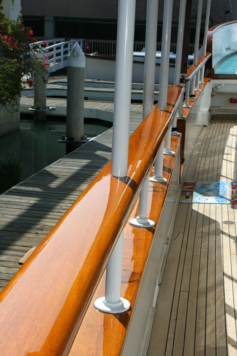 Slide: The Image of Polished wooden railing on a 1946 classic yacht. - 44