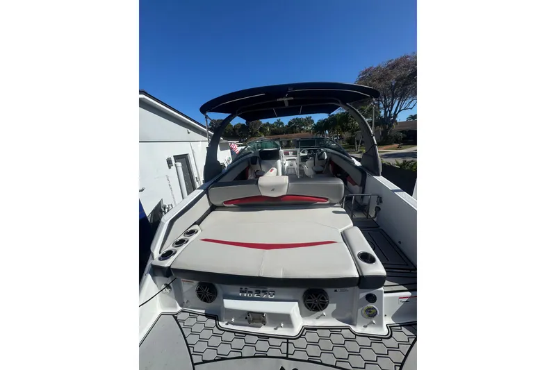 Slide: The Image of 2020 Four Winns HD270 RS boat with spacious seating and sleek design. - 21