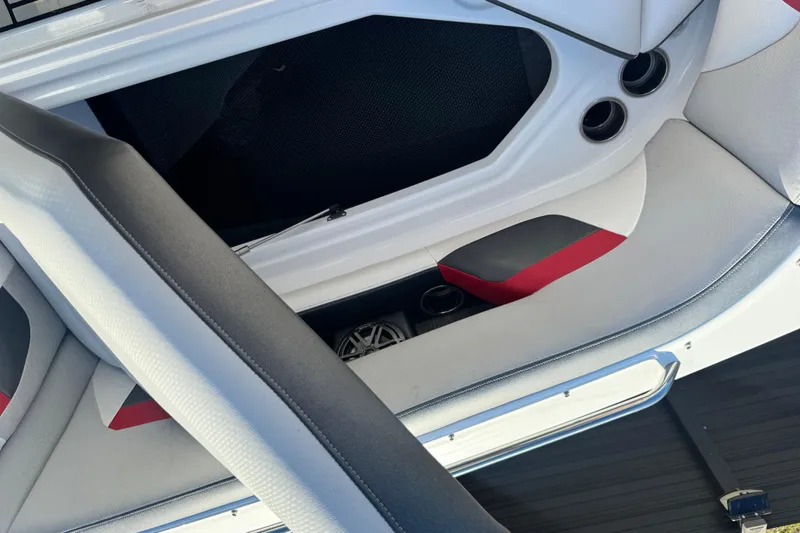 Slide: The Image of 2020 Four Winns HD270 RS boat interior with seating and storage compartments. - 47