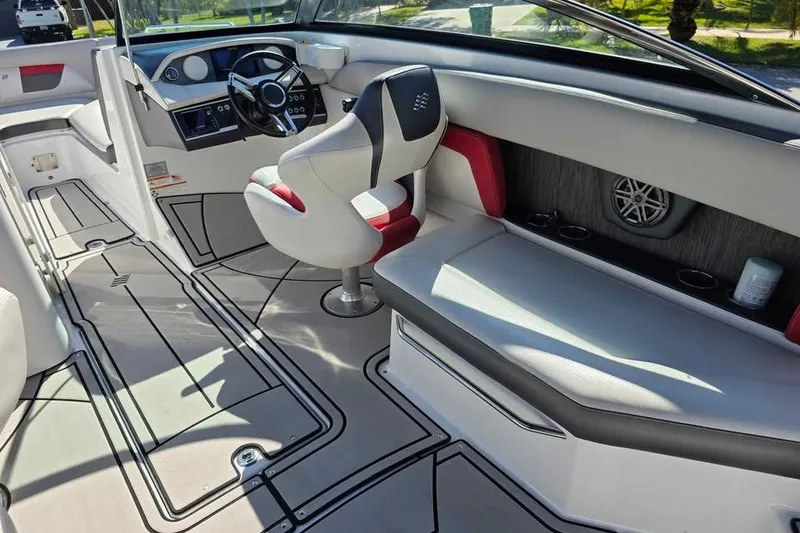 Slide: The Image of 2020 Four Winns HD270 RS boat on trailer, black and red design, registration FL 0417 ST. - 6