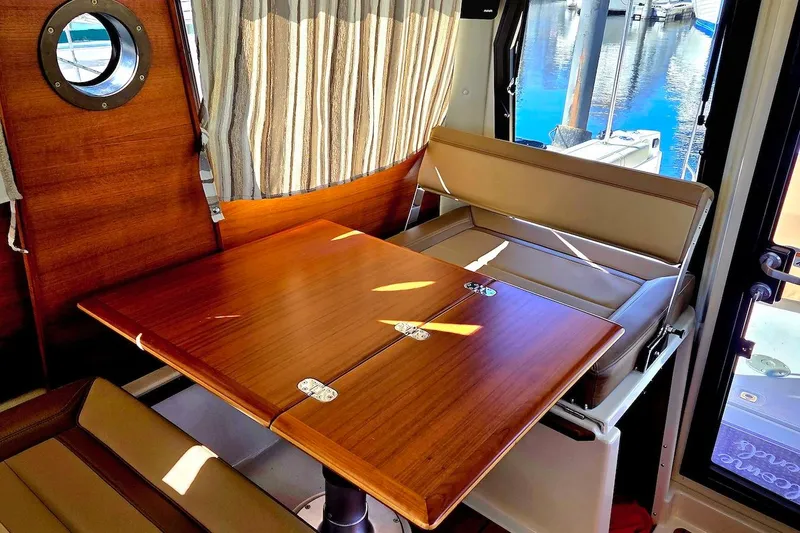 Slide: The Image of Interior of 2022 Ranger Tugs R-27 boat with Garmin navigation system. - 19