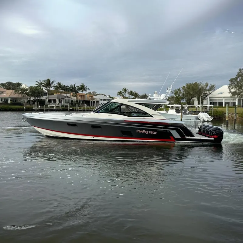 The Image of 2018 Formula 430 Super Sport Crossover yacht cruising in a scenic waterfront setting. - 0