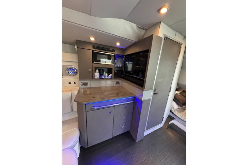 Slide: The Image of Luxurious interior of 2018 Formula 430 Super Sport Crossover with modern kitchenette. - 15