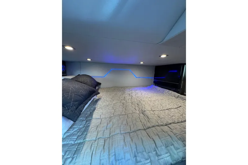 Slide: The Image of Cozy cabin interior of 2018 Formula 430 Super Sport Crossover with ambient lighting. - 19