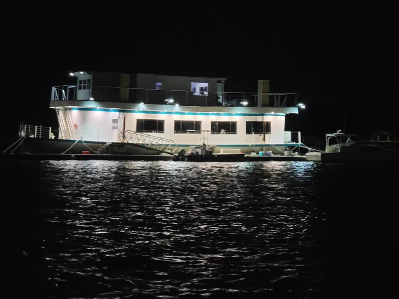 Slide: The Image of Illuminated floating home on water at night, Custom model, 2003. - 28