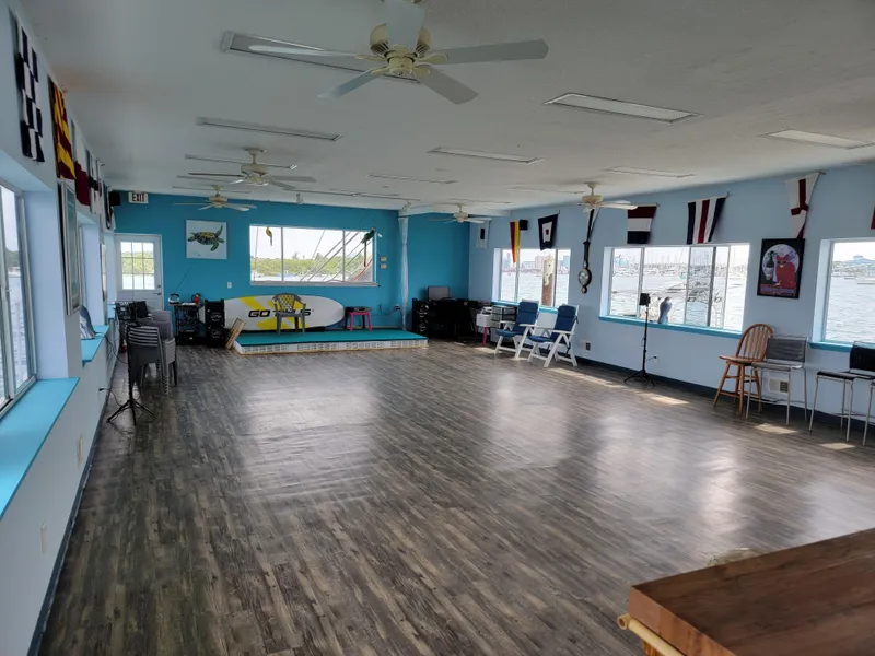 Slide: The Image of Spacious interior of a 2003 custom floating home with wooden floors and nautical decor. - 4