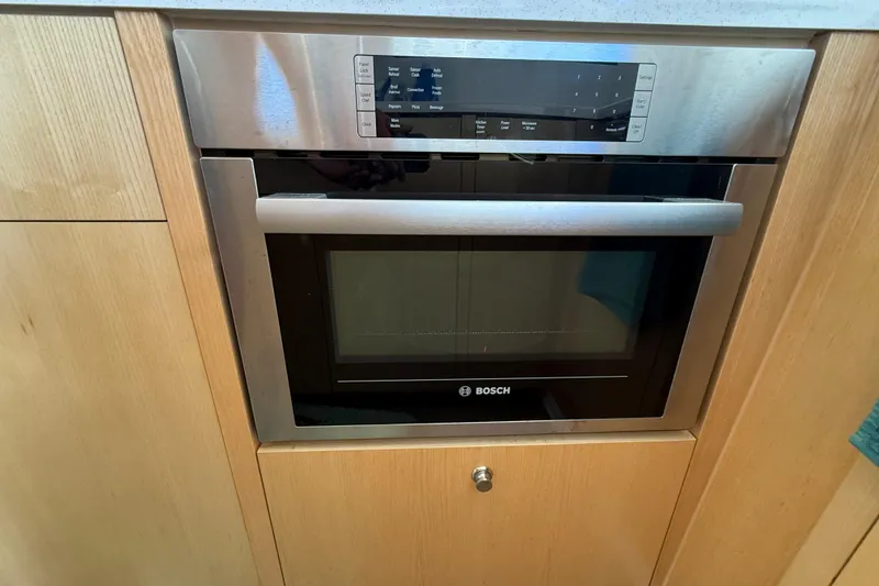 Slide: The Image of Built-in Bosch oven in Seawind 1370 yacht kitchen, 2024 model. - 24