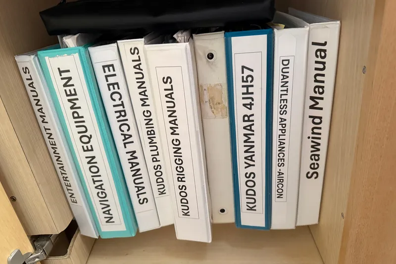 Slide: The Image of Manuals for Seawind 1370, 2024 model, including navigation, electrical, and plumbing guides. - 60