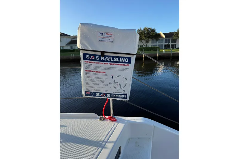 Slide: The Image of S.O.S. Reelsling recovery system on 2024 Seawind 1370 yacht, dockside view. - 85