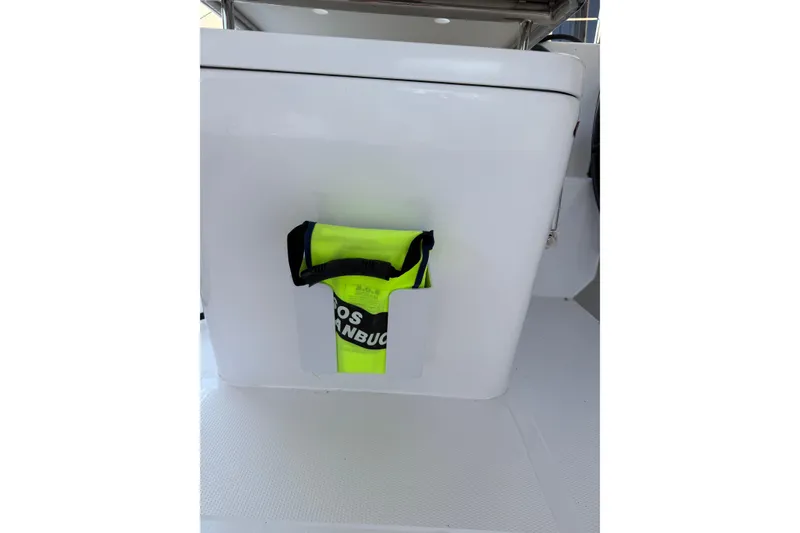 Slide: The Image of 2024 Seawind 1370 boat interior with safety equipment storage. - 88