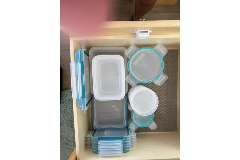 Slide: The Image of Organized drawer with plastic food containers, Seawind 1370, 2024 model. - 96