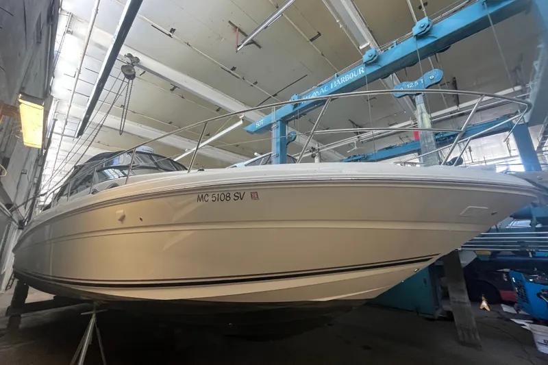 The Image of 2005 Sea Ray 360 Sundancer boat in indoor storage facility. - 0