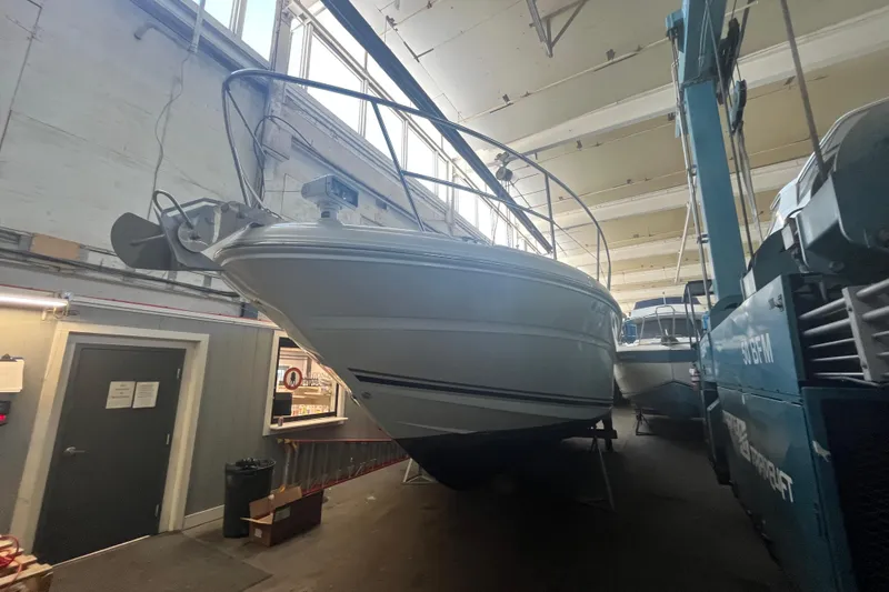 Slide: The Image of 2005 Sea Ray 360 Sundancer yacht in indoor storage facility. - 1