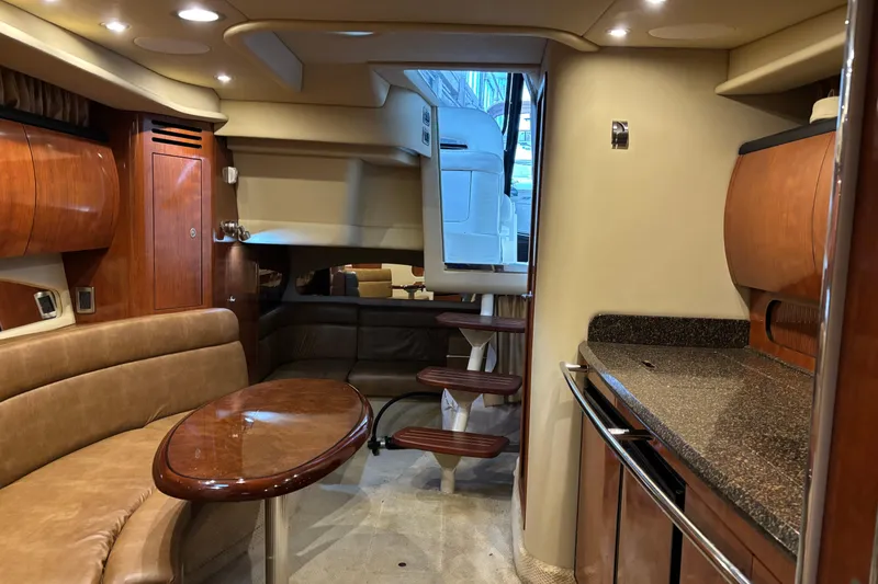 Slide: The Image of Flat screen TV on 2005 Sea Ray 360 Sundancer boat interior. - 17