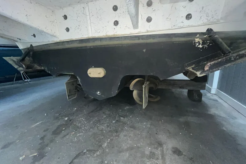 Slide: The Image of 2005 Sea Ray 360 Sundancer boat underside with propeller and rudder visible. - 5