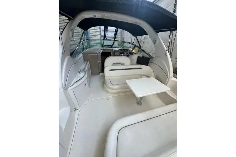 Slide: The Image of Raymarine VHF radio on 2005 Sea Ray 360 Sundancer boat dashboard. - 8