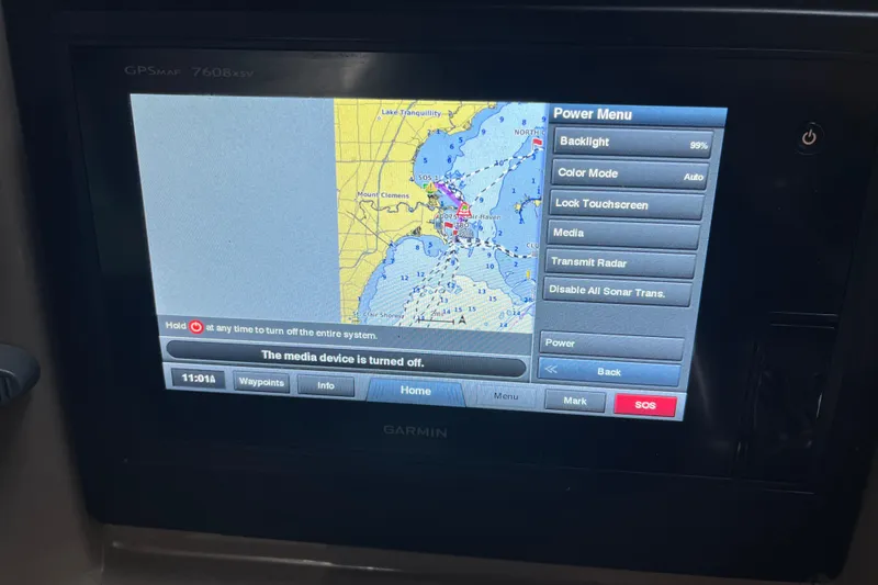 Slide: The Image of Garmin GPS display on 2005 Sea Ray 360 Sundancer, showing navigation map and power menu. - 9