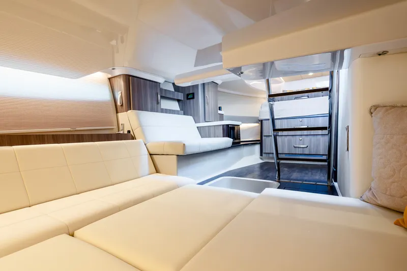 Slide: The Image of Luxurious interior of 2022 Regal 36 Grande Coupe yacht with modern furnishings. - 28
