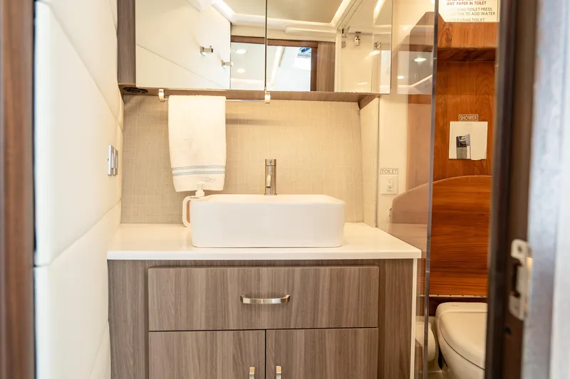 Slide: The Image of Luxurious bathroom interior of 2022 Regal 36 Grande Coupe yacht. - 34
