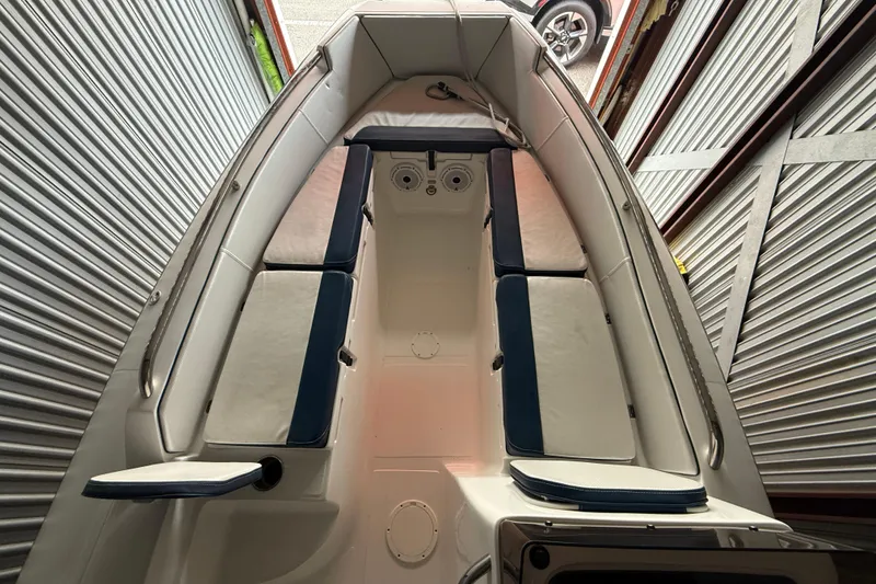 Slide: The Image of 2023 AB Inflatables Nautilus 17 DLX boat interior with cushioned seating in storage. - 8