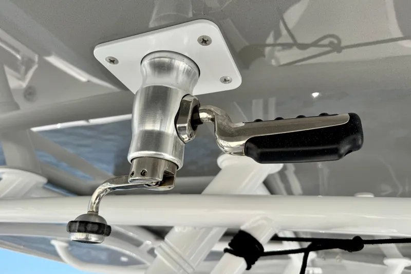 Slide: The Image of Close-up of a 2024 Intrepid 407 Nomad FE boat handle mechanism. - 59