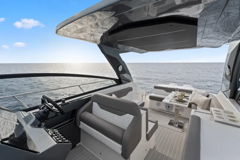 Slide: The Image of Luxurious 2026 Valiatt 380 GT yacht interior with ocean view and elegant seating area. - 2
