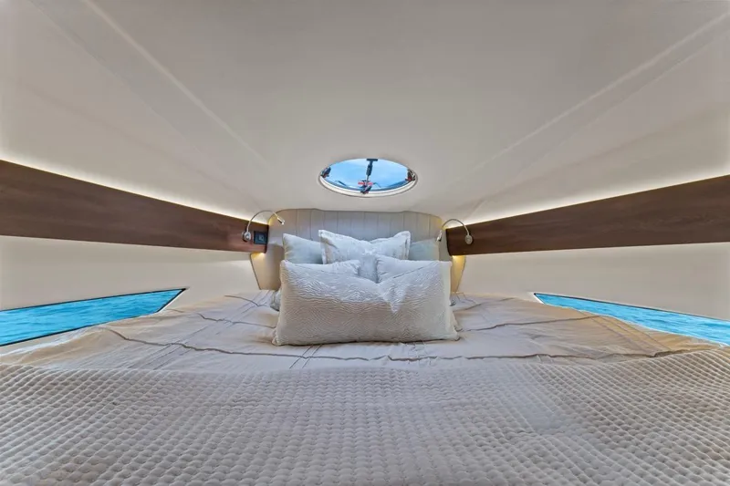 Slide: The Image of Luxurious interior cabin of 2026 Valiatt 380 GT yacht with elegant bedding and ambient lighting. - 4
