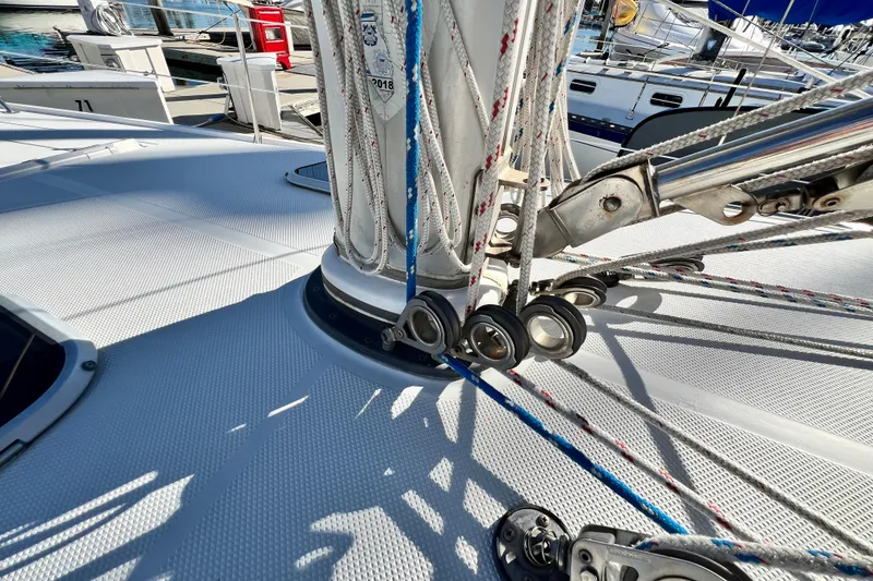 Slide: The Image of Deck view of a 1998 Catalina 36 MkII sailboat with rigging and pulleys. - 18