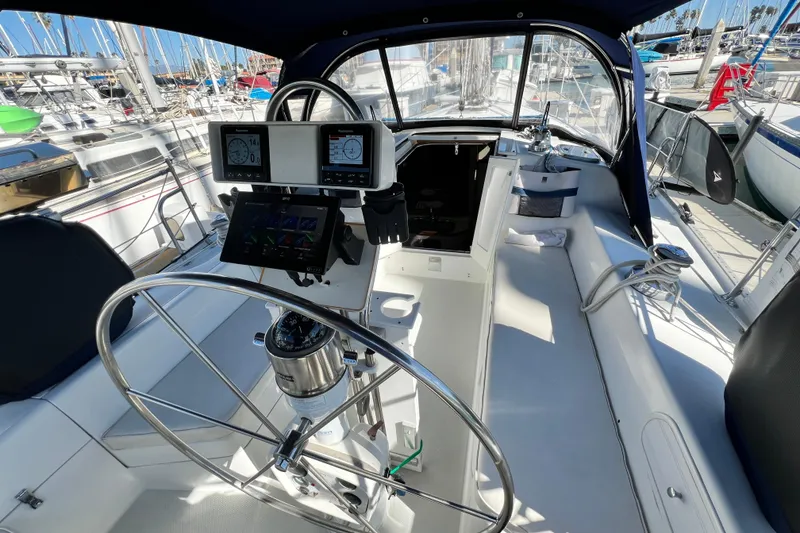 Slide: The Image of Cockpit of 1998 Catalina 36 MkII sailboat with steering wheel and navigation instruments. - 26