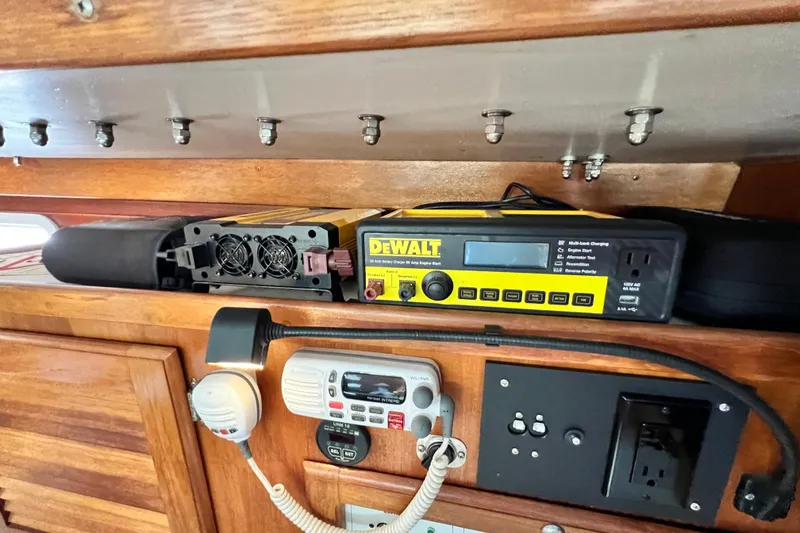 Slide: The Image of DeWalt battery charger in 1998 Catalina 36 MkII boat interior with wooden paneling. - 44