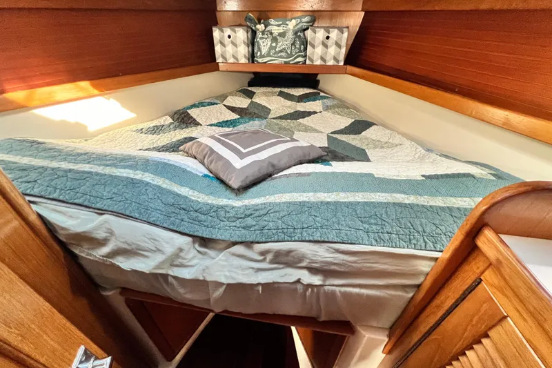 Slide: The Image of Cozy cabin interior of 1998 Catalina 36 MkII sailboat with quilted bedding. - 46
