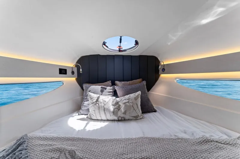 Slide: The Image of Luxurious interior cabin of 2026 Valiatt 350 GT yacht with cozy bedding and ocean view. - 7