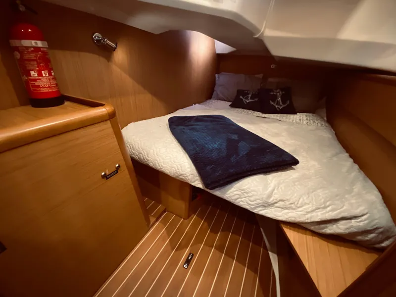 Slide: The Image of Interior of Jeanneau Sun Odyssey 44i, 2010, featuring cozy bed. - 13