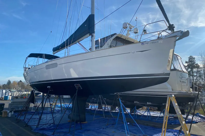 Slide: The Image of Jeanneau Sun Odyssey 44i sailboat from 2010 on stands in a marina. - 31