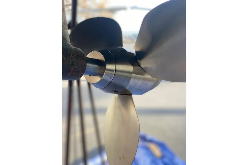 Slide: The Image of Close-up of Jeanneau Sun Odyssey 44i 2010 sailboat propeller, showcasing sleek metal blades. - 39