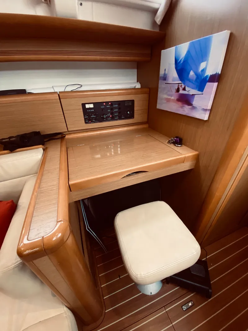 Slide: The Image of Interior of 2010 Jeanneau Sun Odyssey 44i with wooden furnishings. - 8