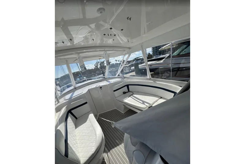Slide: The Image of 2015 Intrepid 400 Cuddy interior with sleek seating and modern design. - 15