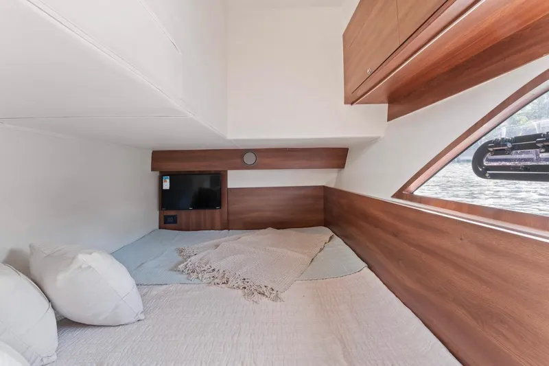 Slide: The Image of Luxurious cabin interior of 2026 Valiatt 410 HT yacht with modern design and large window. - 8