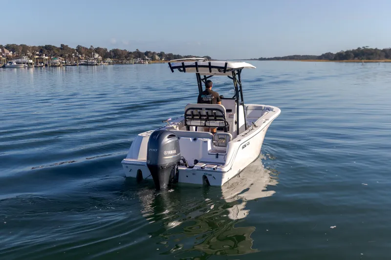 Slide: The Image of 2022 Sea Fox 228 Commander boat cruising on calm water. - 4