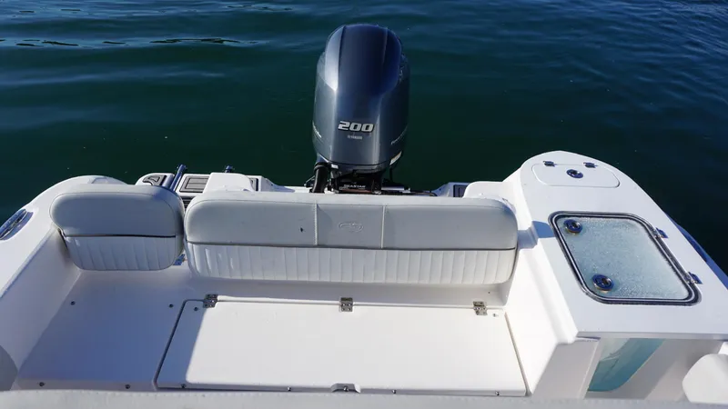 Slide: The Image of 2022 Sea Fox 228 Commander boat with Yamaha 200 engine, rear seating, and water view. - 5