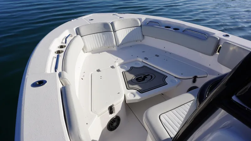 Slide: The Image of 2022 Sea Fox 228 Commander boat interior with cushioned seating and storage compartments. - 8