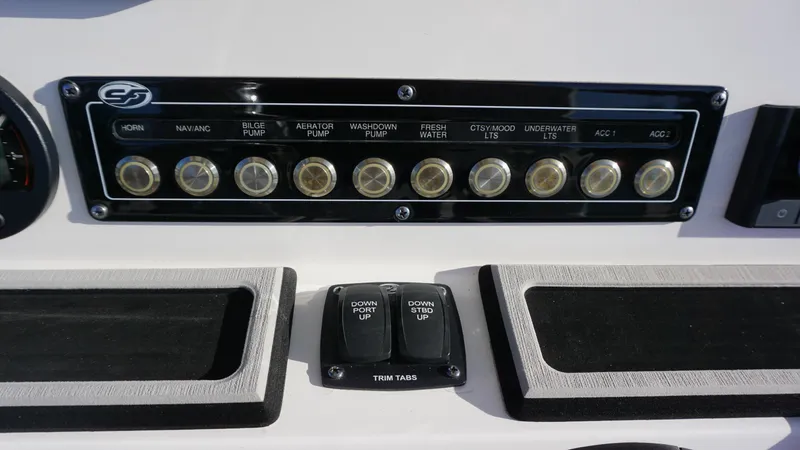 Slide: The Image of Control panel of 2022 Sea Fox 228 Commander boat with labeled switches. - 9