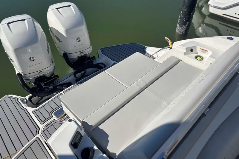 Slide: The Image of 2020 Sea Ray SLX 350 Outboard with dual engines and spacious seating area. - 14