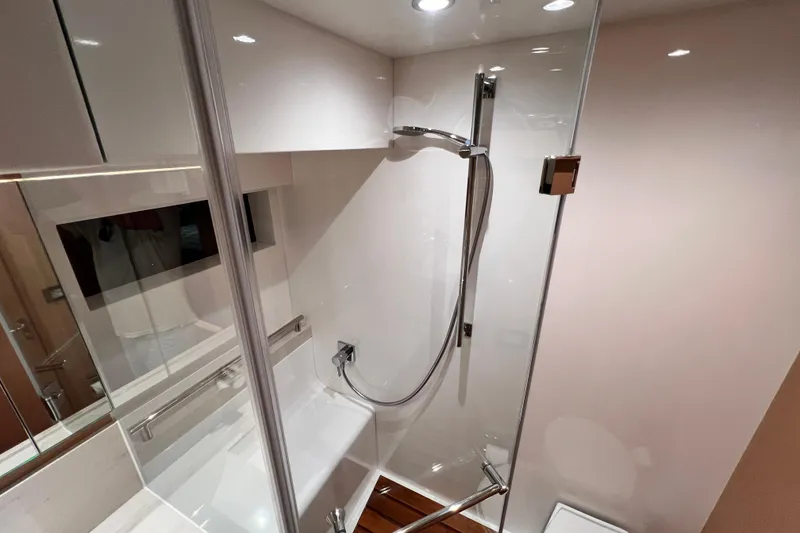 Slide: The Image of Modern shower area in 2024 Hylas H57 yacht, featuring sleek glass and chrome fixtures. - 24