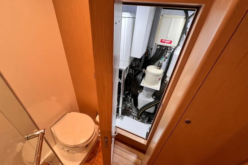 Slide: The Image of 2024 Hylas H57 yacht interior showing bathroom and technical compartment. - 25