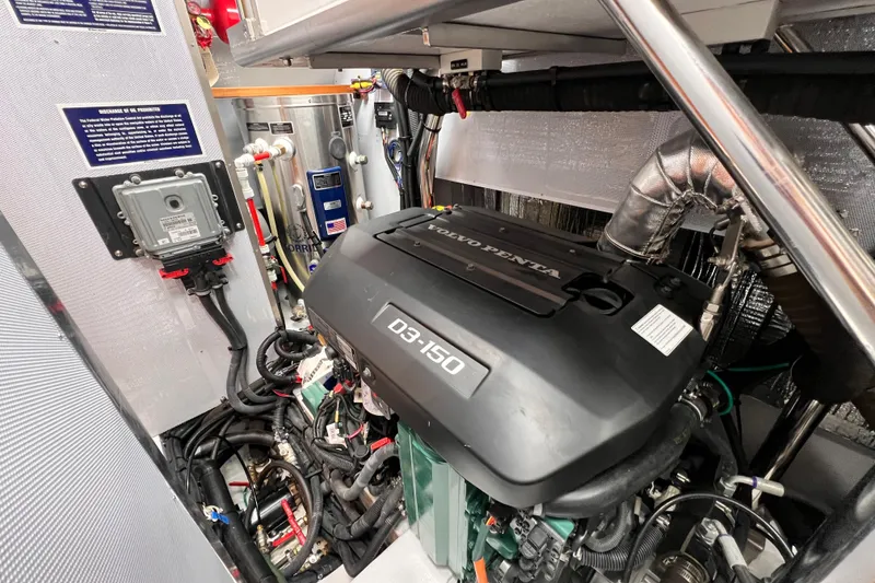 Slide: The Image of Engine room of 2024 Hylas H57 yacht featuring Volvo Penta D3-150 engine. - 27