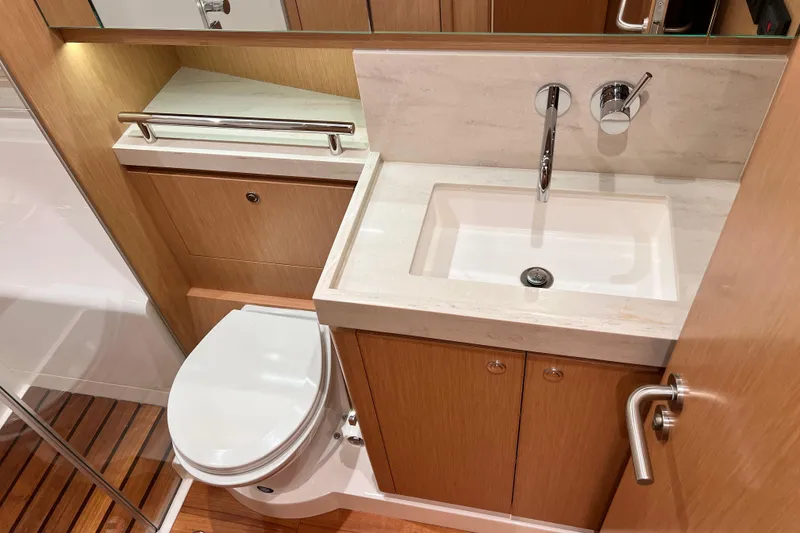 Slide: The Image of Luxurious bathroom in 2024 Hylas H57 yacht with modern sink and toilet. - 31