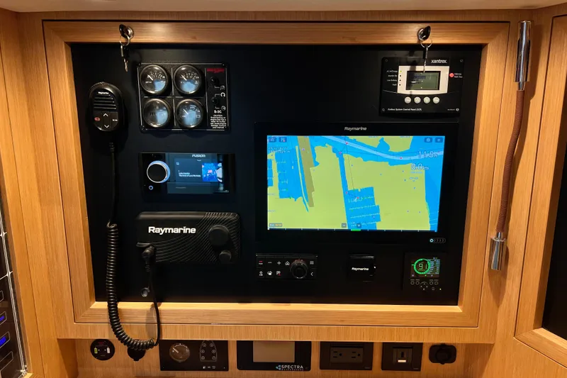 Slide: The Image of Navigation panel of 2024 Hylas H57 yacht with Raymarine electronics and control systems. - 35